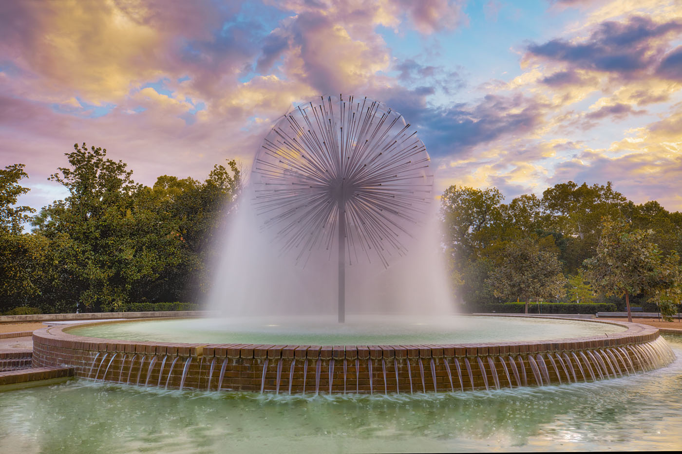The Dandelion Fountain, formally knows as the Wortham Memorial Fountain, keeps the water flowing on a cool November morning just after sunrise. This fountain sits alongside Allen Parkway near Buffalo Bayou.